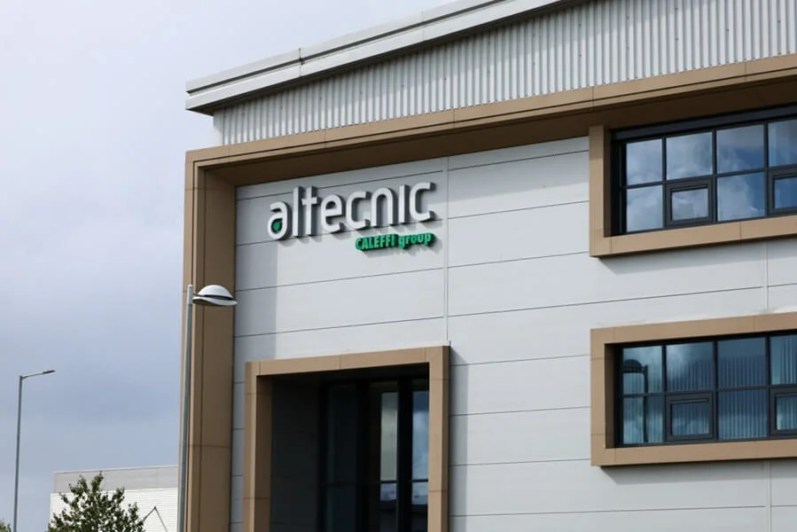 An image of the Altecnic signage on the side of a building.